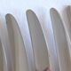 12 couteaux de table métal argenté