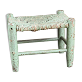 Old wooden and straw stool