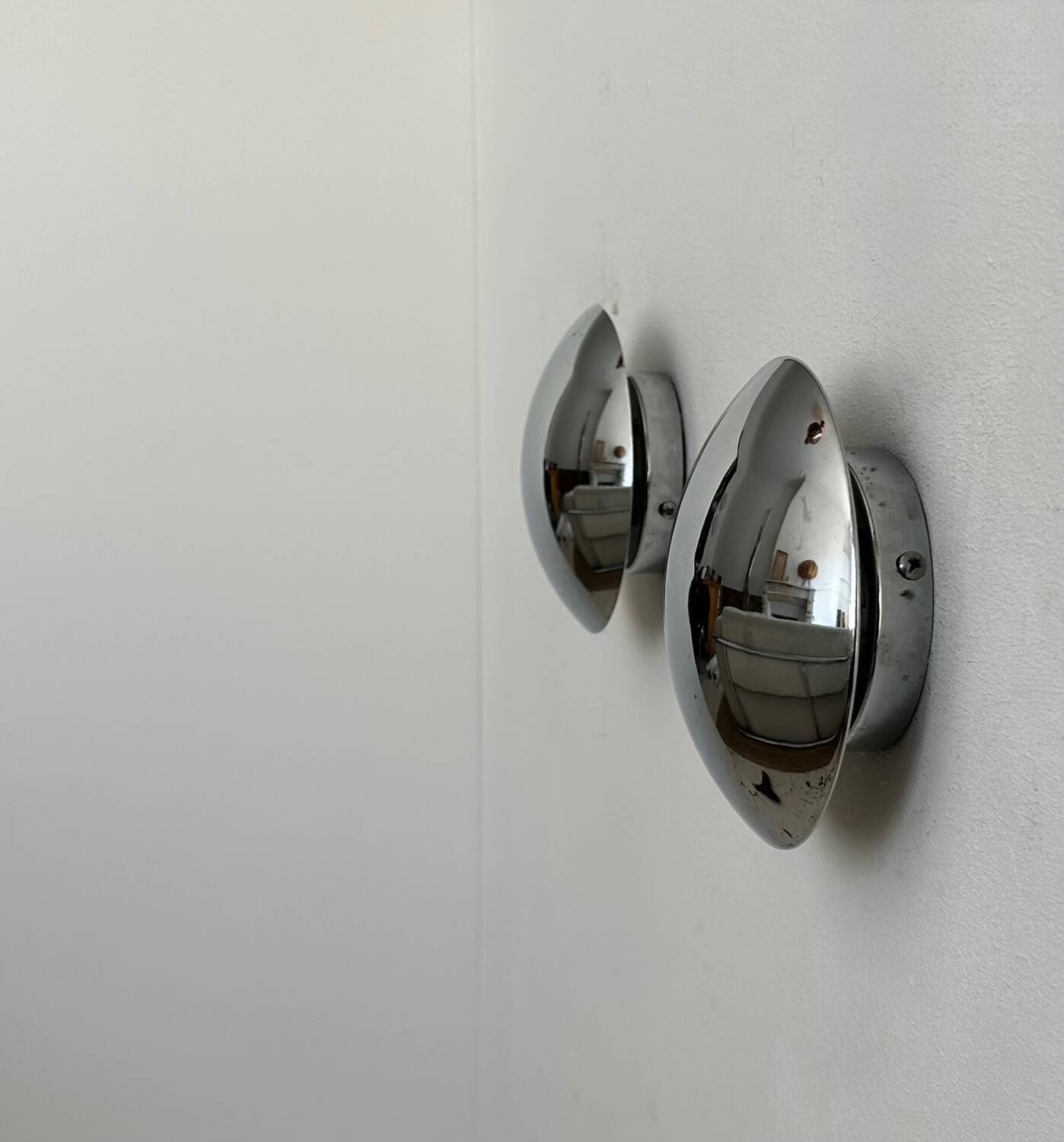 Pair of vintage chrome wall lights, France 1980