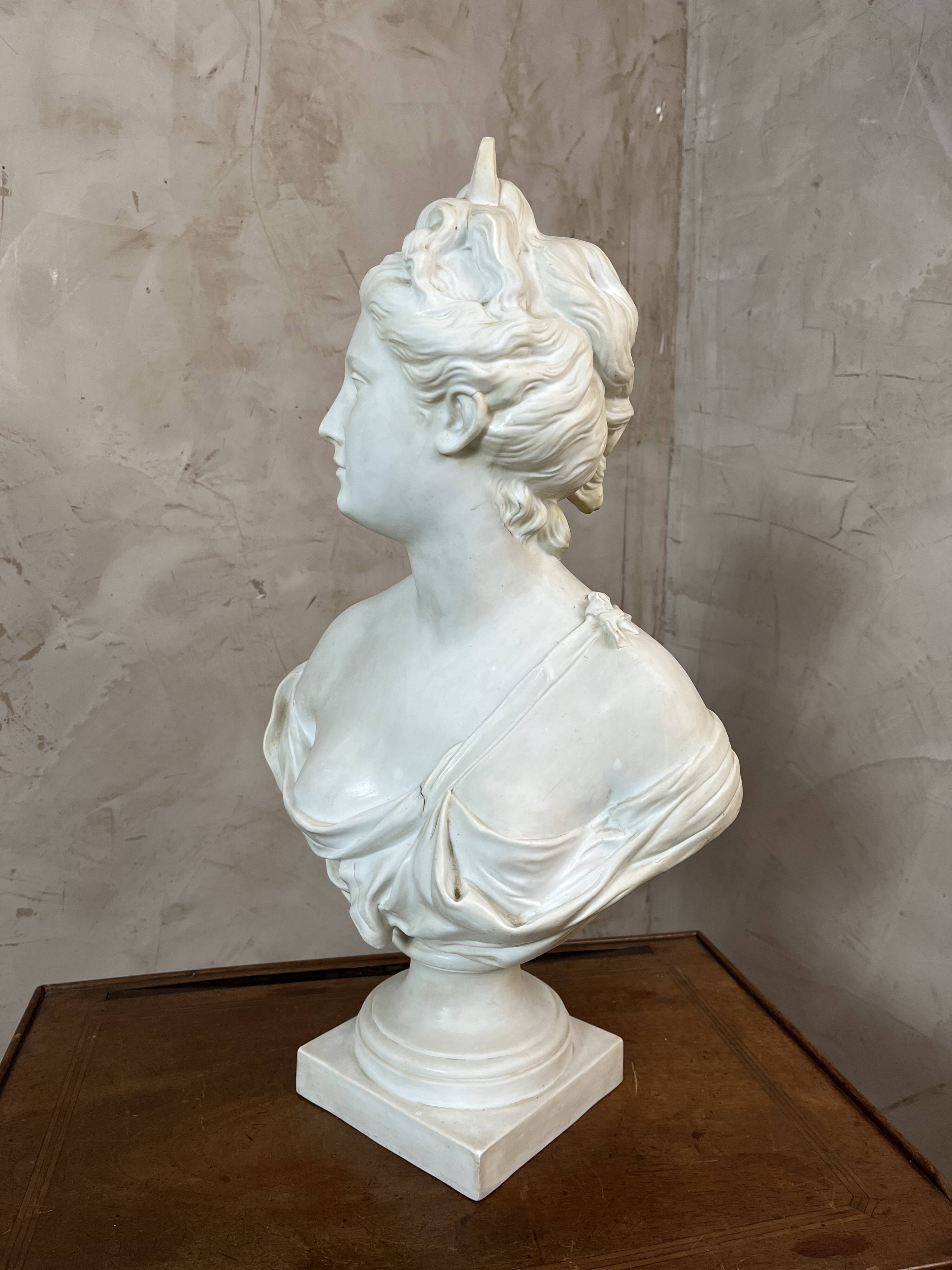 Bust of a woman in Biscuit signed