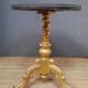 Gilded wooden pedestal table