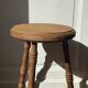 Vintage stool in raw wood