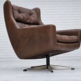 Années 1970, chaise pivotante danoise avec repose-pieds, bon état d'origine, cuir.