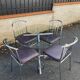 Vintage 1980s round table set with 4 chairs.