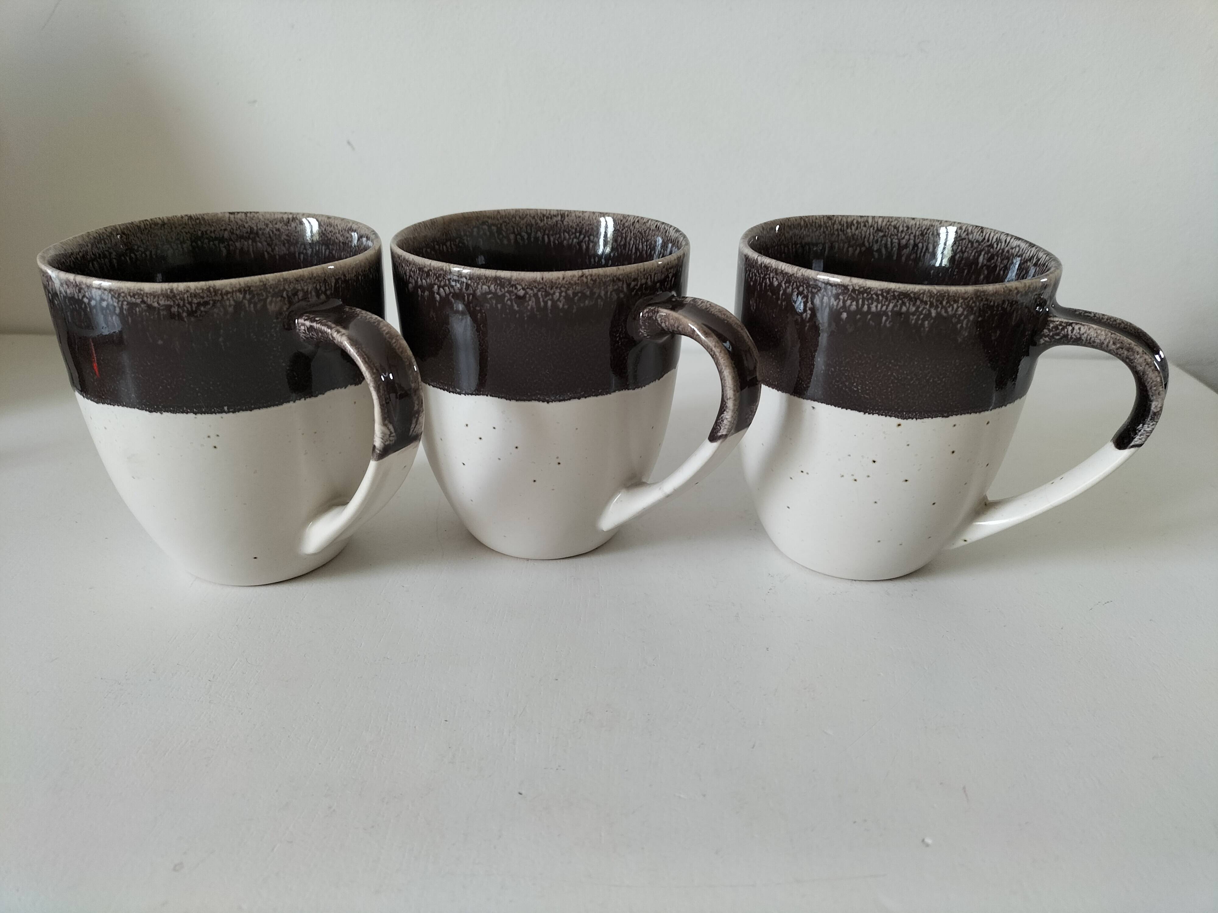 Set of three two-tone mugs, glazed stoneware, café workshop style.