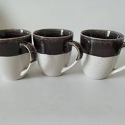 Set of three two-tone mugs, glazed stoneware, café workshop style.