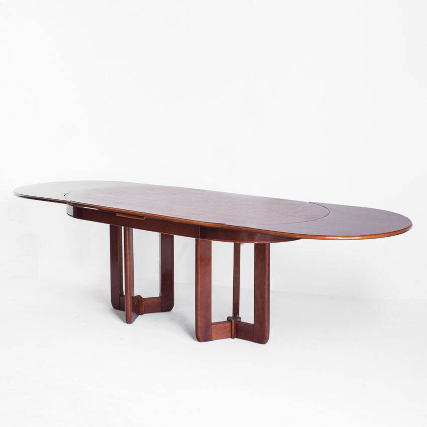 Vintage dining table with two extensions in varnished elm. Spain, 80s.