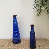 Lot of 2 soliflore vases in twisted blue glass