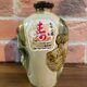 Japanese Awamori Bottle by the Helios Distillery (Okinawa) with Raised Lion and Dragon Design