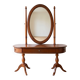 Traditional wooden dressing table with oval mirror.