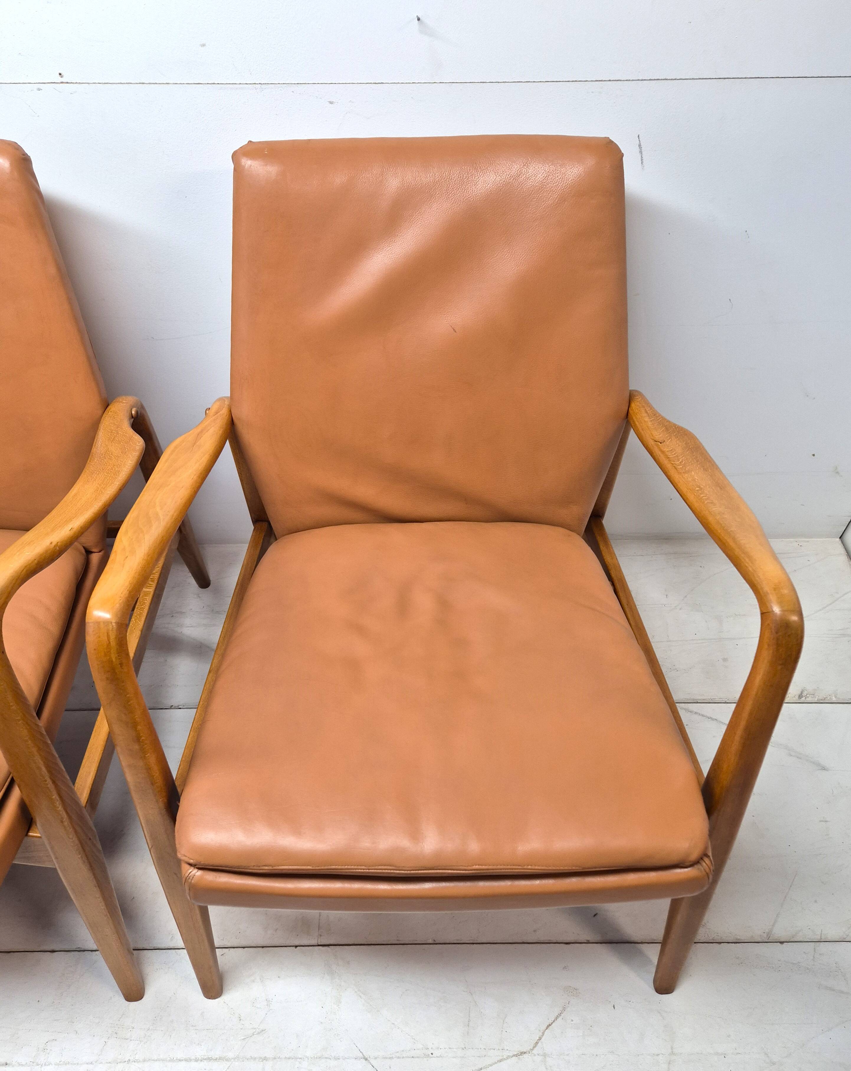 Pair of Scandinavian armchairs attributed to Axel Larsson, circa 1960.