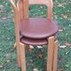 Pair of chairs by Swiss designer Bruno Rey in wood and brown skai