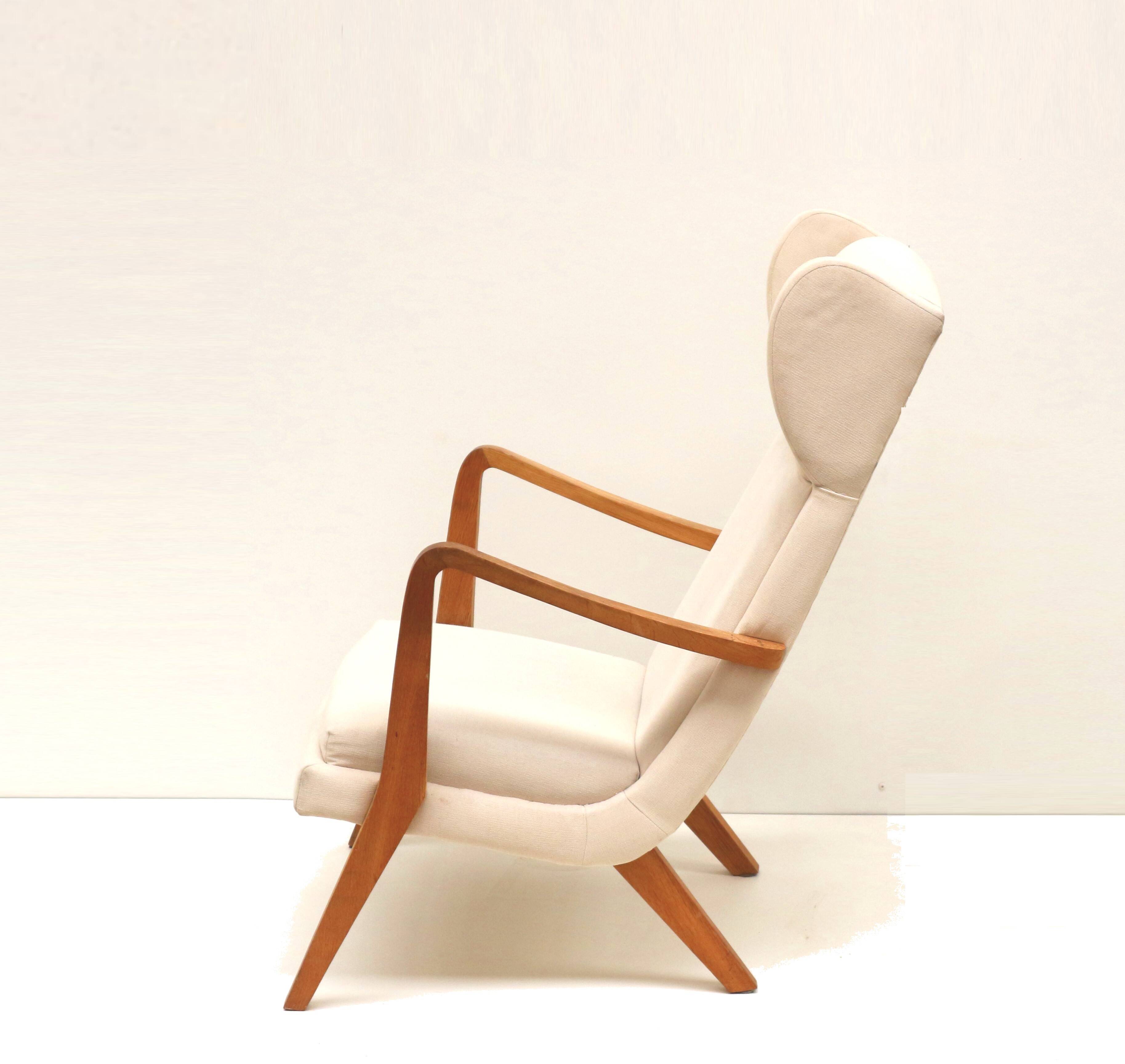 Danish design vintage armchair with cream upholstery from the 70s