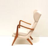 Danish design vintage armchair with cream upholstery from the 70s