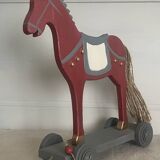 Antique toy, small horse on wheels