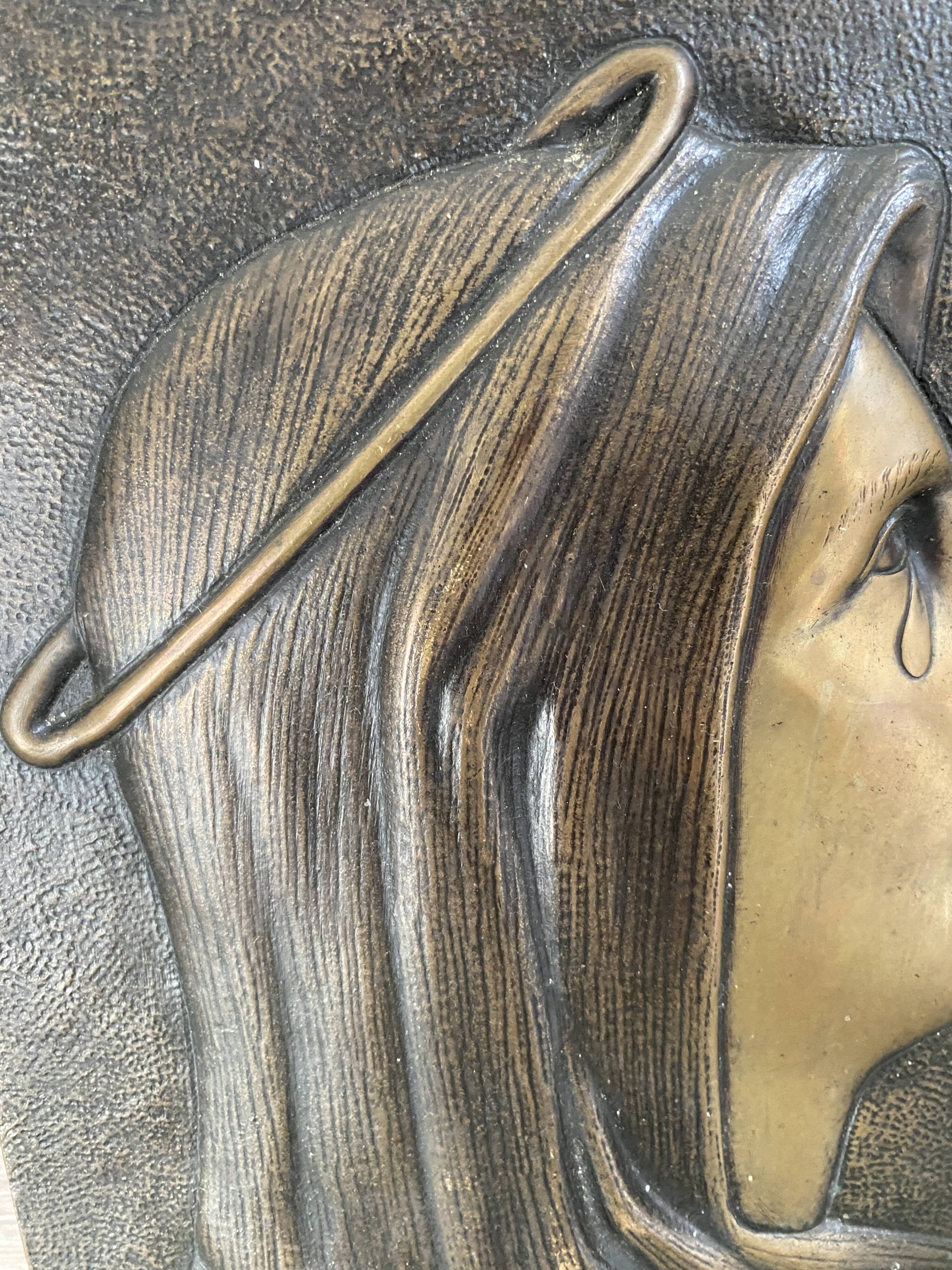 Bronze bas-relief of the Virgin