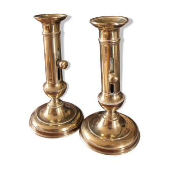 Pair brass candle holders with pusher
