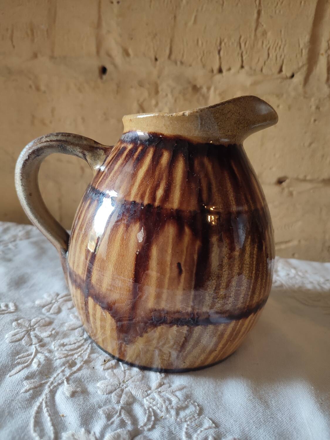 Old sandstone pitcher vase