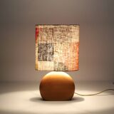 Small carved wooden floor lamp with oval shade