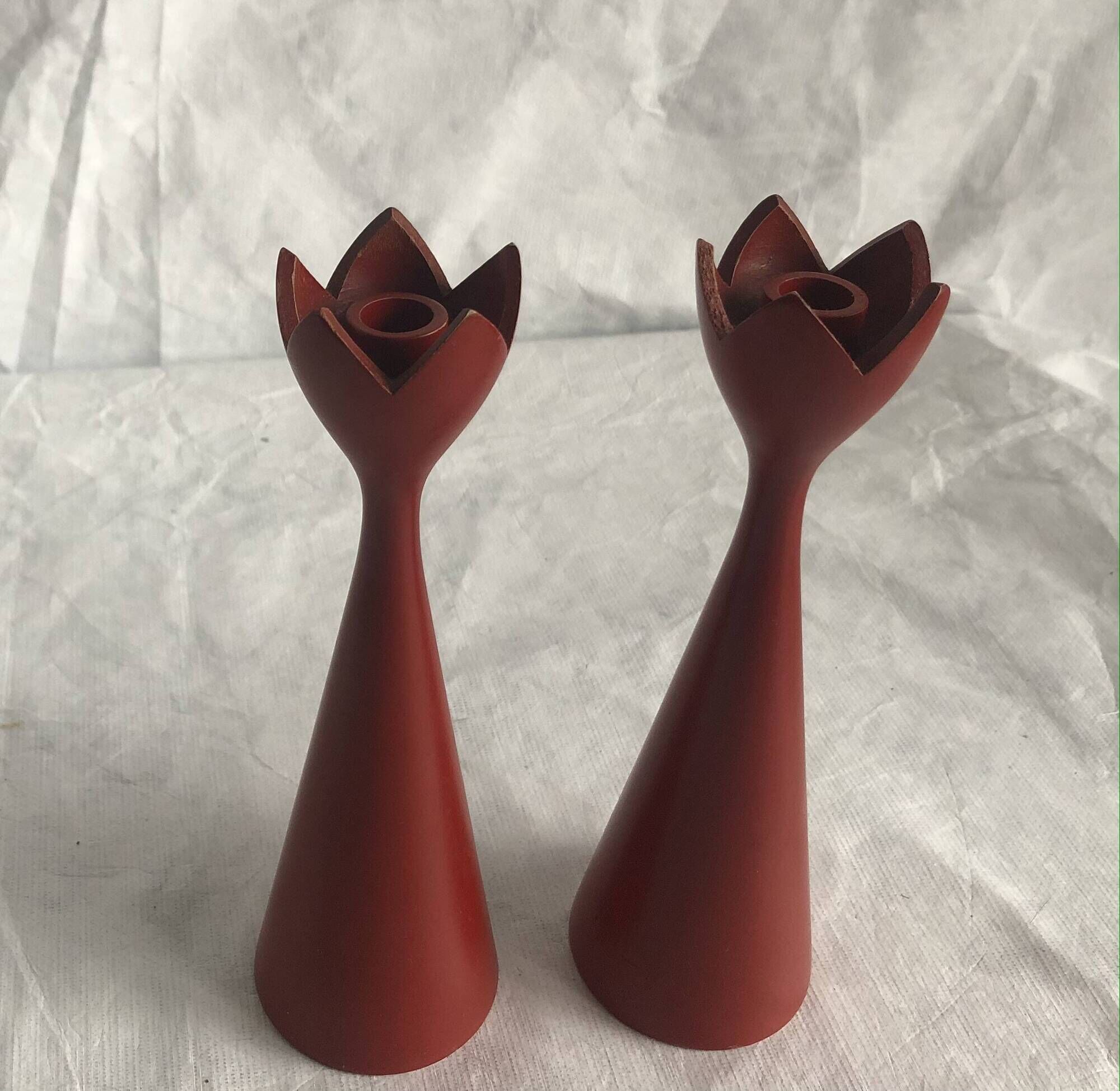 pair of Scandinavian painted wooden candle holders, minimalist atmosphere, free form