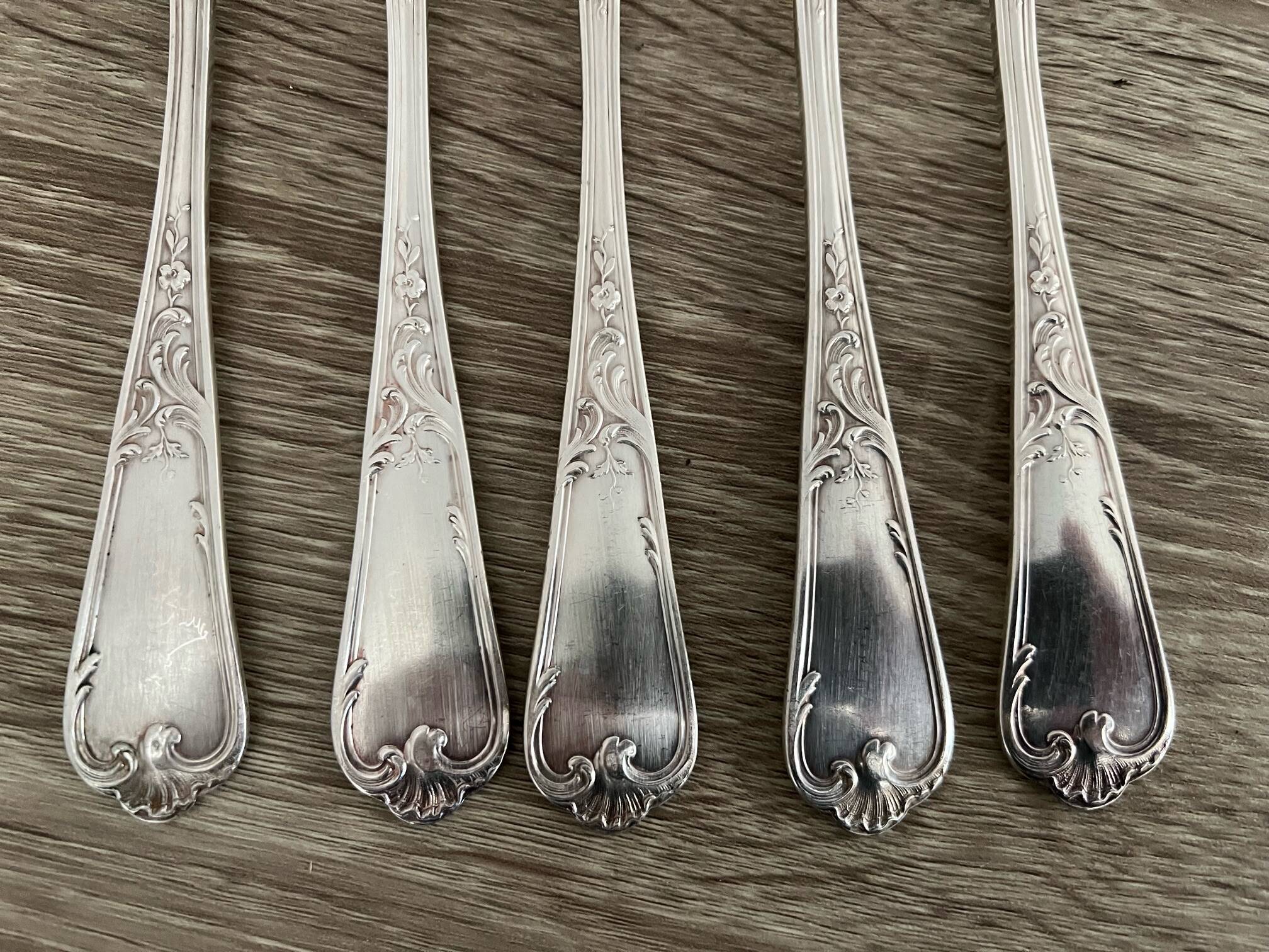 5 silver-plated metal forks with the Ercuis hallmark.