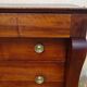 Antique chest of drawers with cross motifs, made entirely of solid walnut.