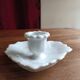 Night or hand-held porcelain candle holder in the shape of a leaf.