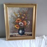 Tableau pot de fleurs signé en bas à gauche Robert Mogisse