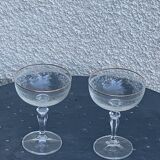 Two crystal champagne glasses and gilded borders antique engraved pattern
