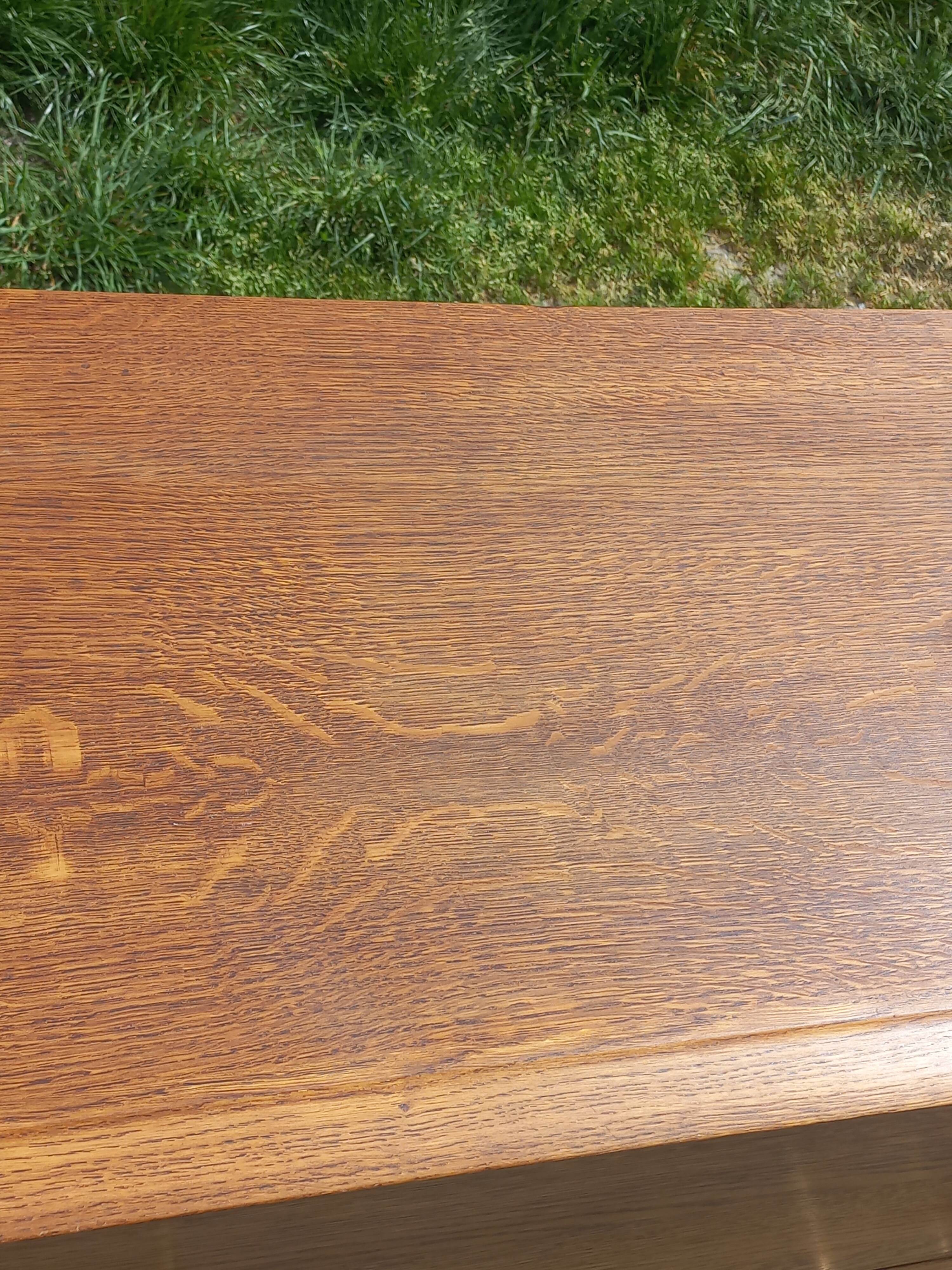 Vintage oak commode with tapered legs from the 1950s.
