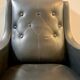 2 vintage faux leather armchairs