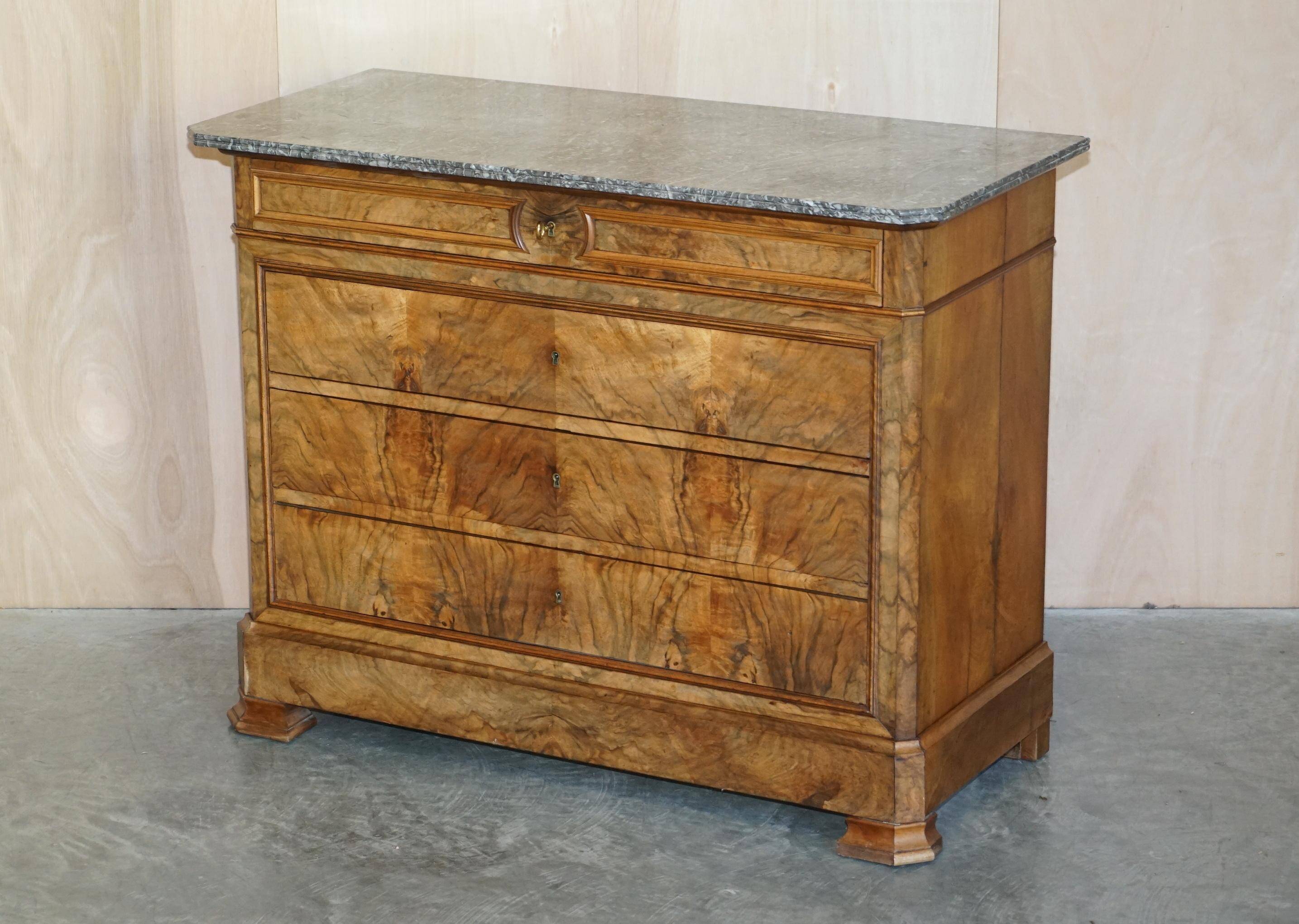Antique walnut commode from 1860 with a marble top and original key.