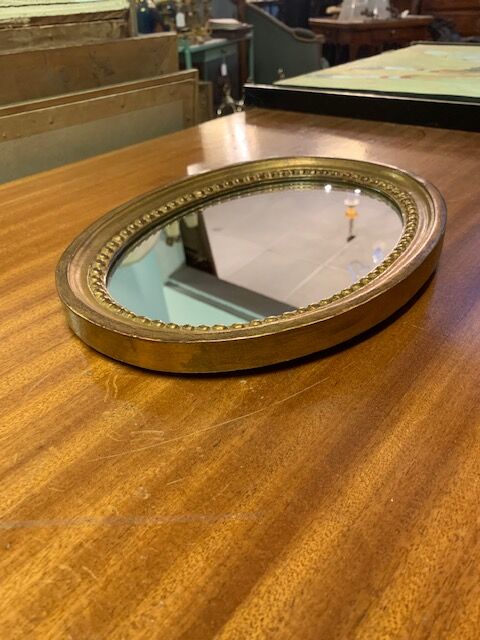 Golden mirror with pearl ring, 31x24 cm