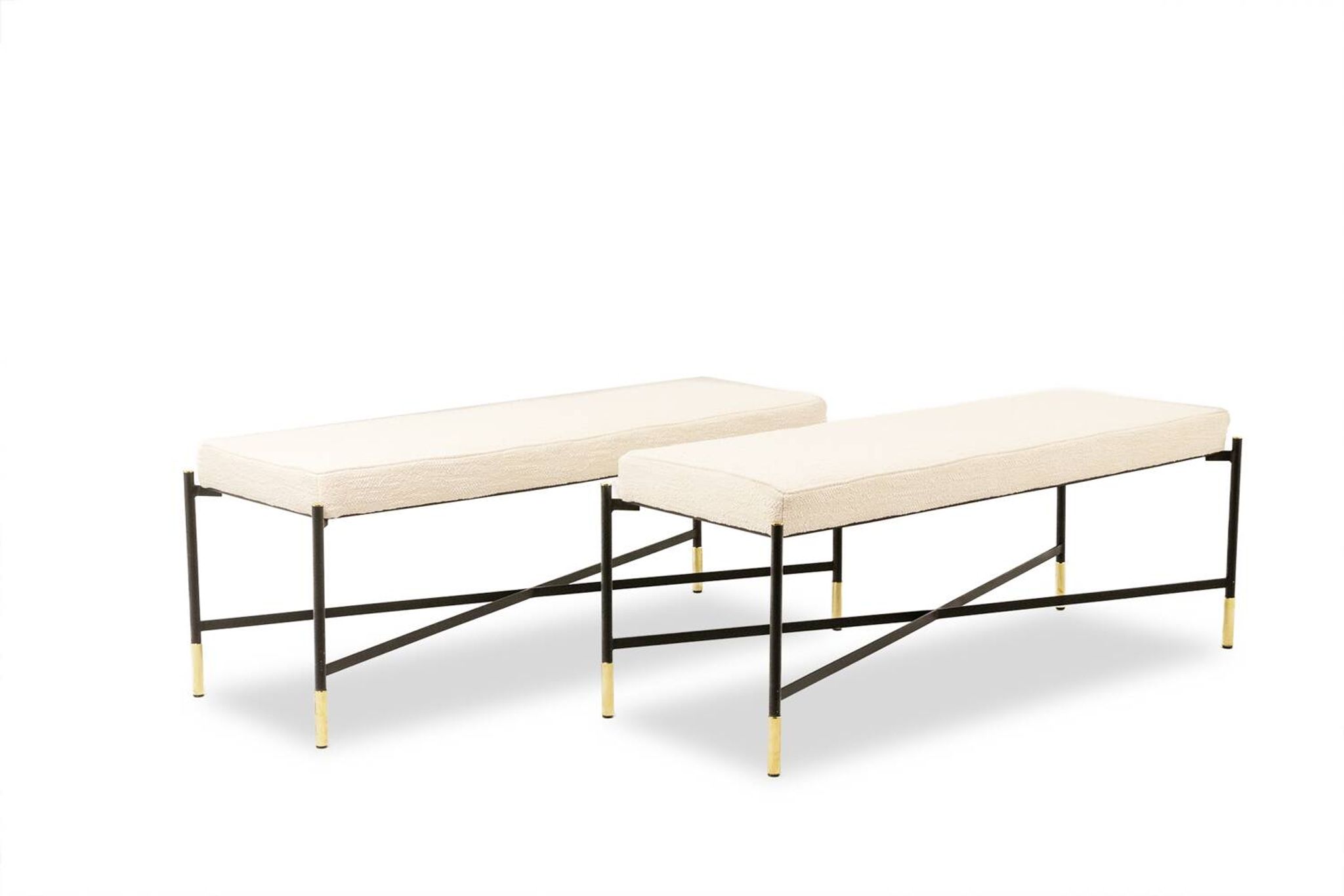 Pair of white benches, in lacquered and gilded metal. 2000s.