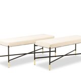Pair of white benches, in lacquered and gilded metal. 2000s.