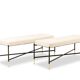 Pair of white benches, in lacquered and gilded metal. 2000s.