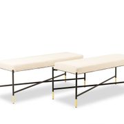 Pair of white benches, in lacquered and gilded metal. 2000s.