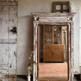 The large patinated trumeau mirror