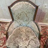 Paire de fauteuils bergères de style Louis XVI