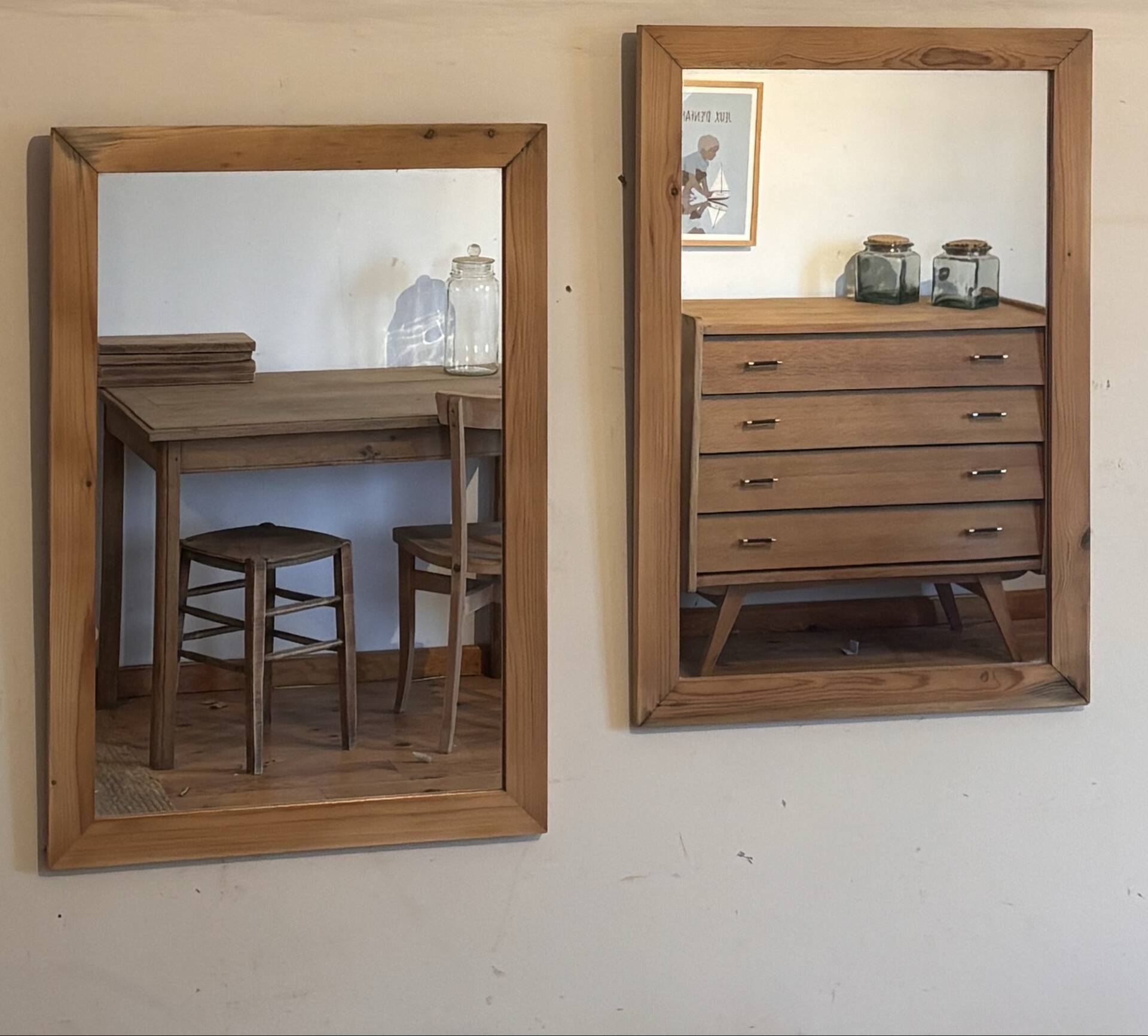 Pair of vintage antique mirrors in raw solid wood.