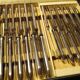 Coffret de 24 couteaux en métal argenté ancien