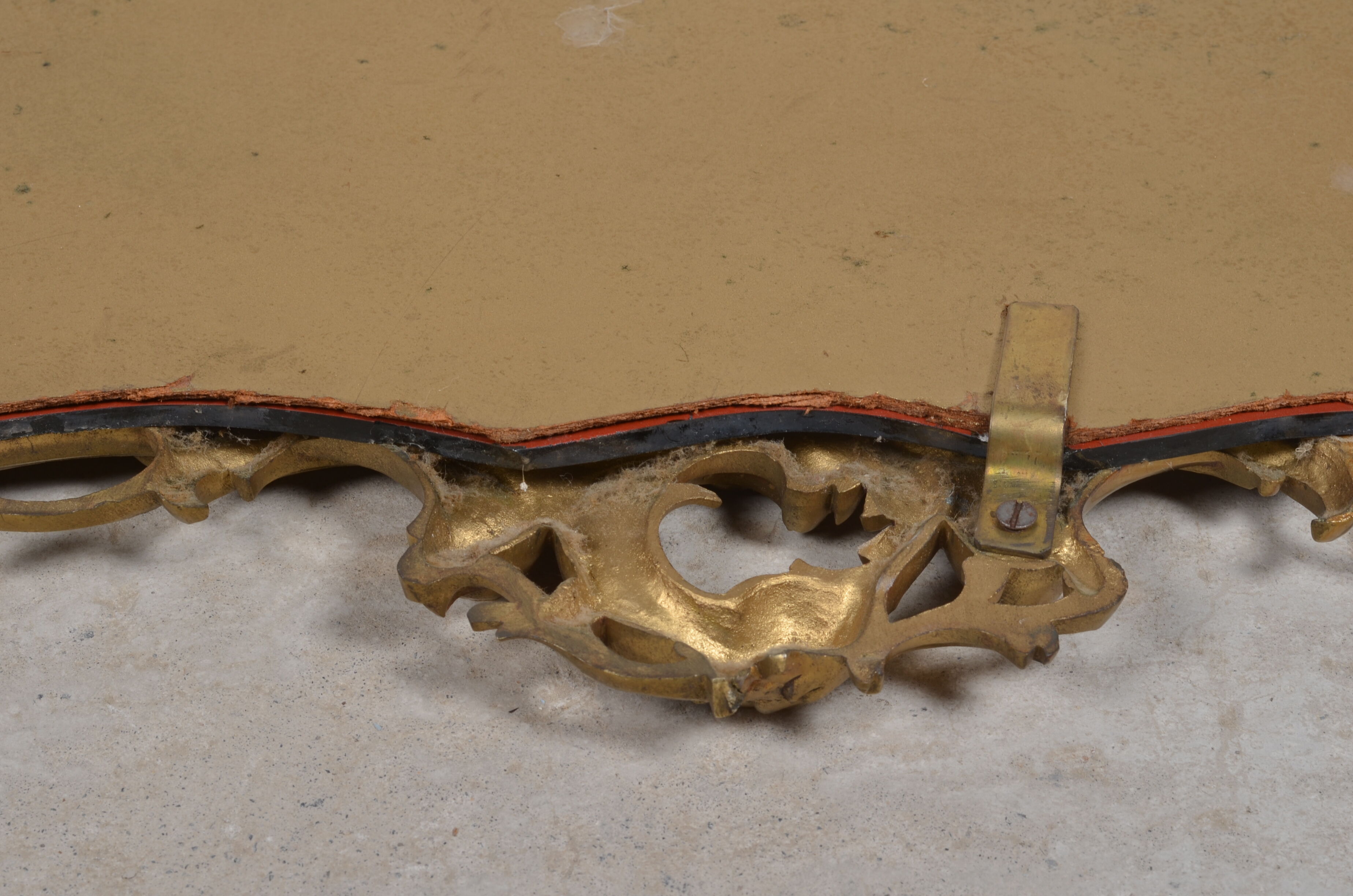 Mirror with baroque style parecloses in bronze 102 x 61 cm