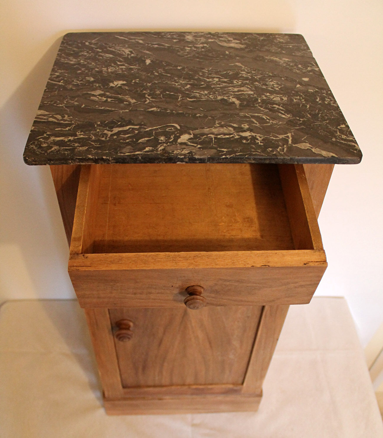 Natural wooden bedside table