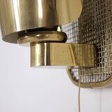 Style perforated brass wall light
