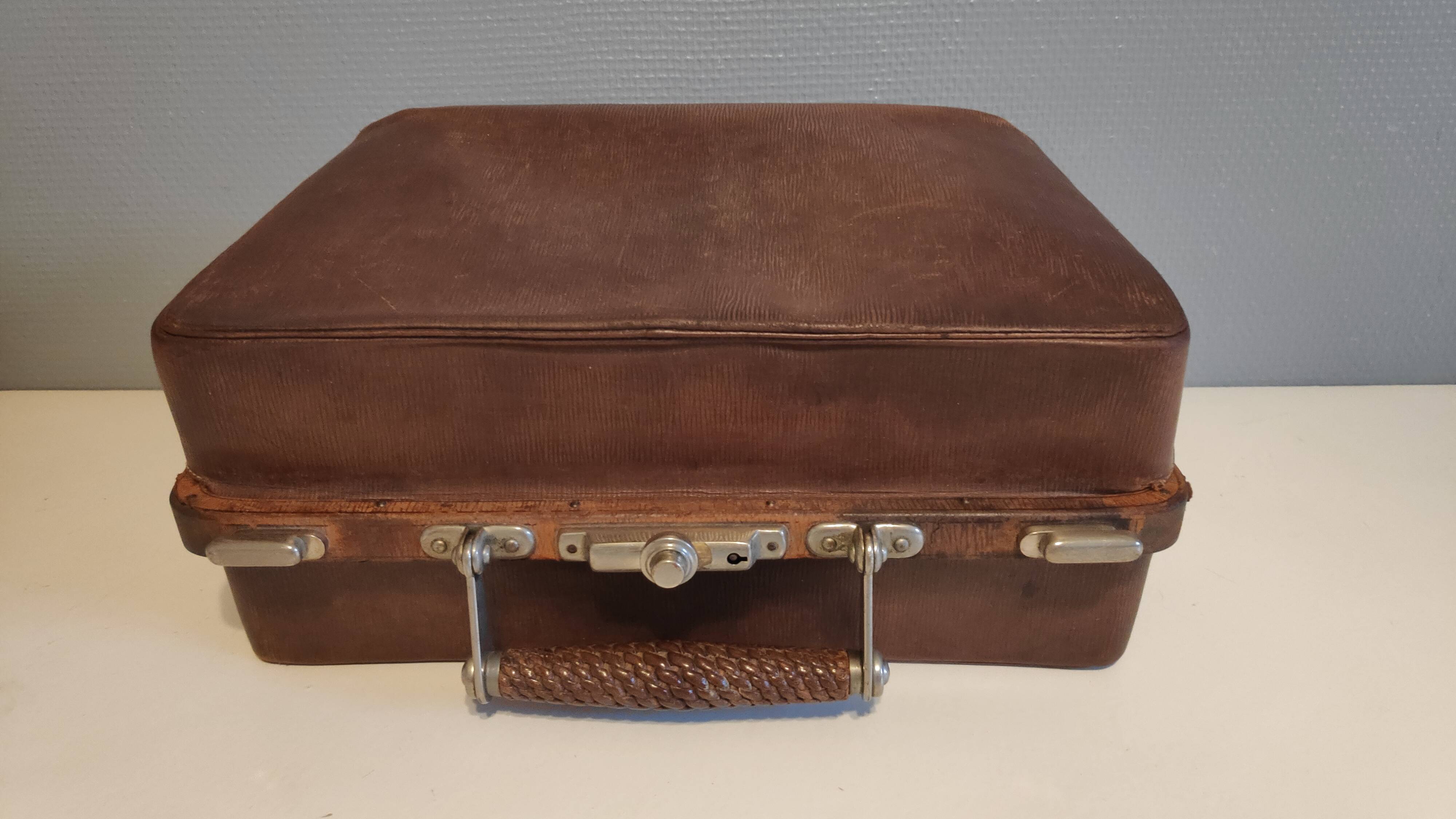 Old leather briefcase with 2 inner 