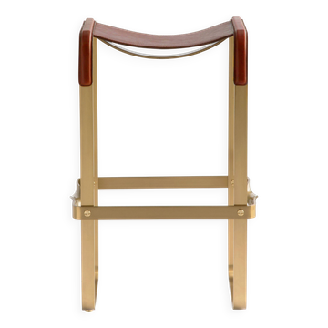 Contemporary kitchen stool, aged brass metal and cognac leather.