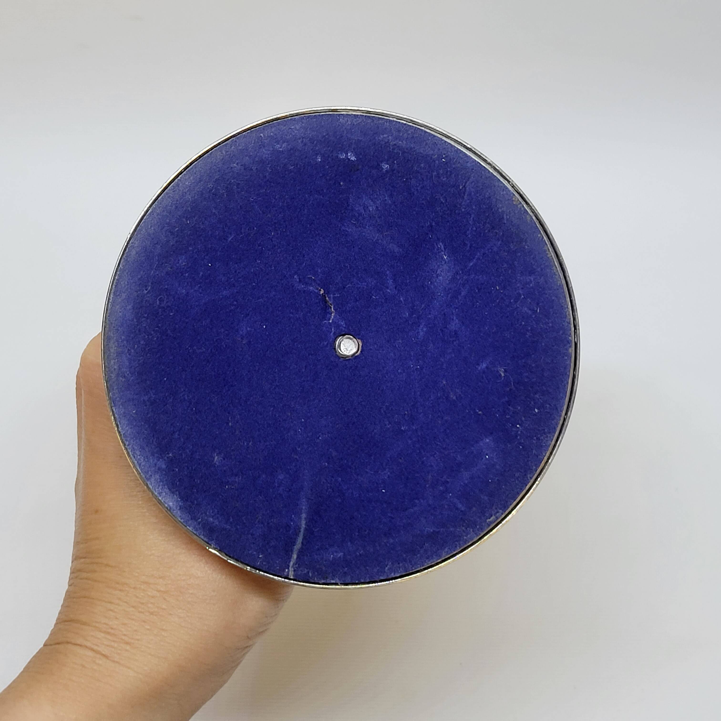 Old candle holder in silver metal