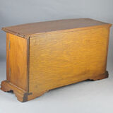 Wooden jewelry box in the shape of a chest of drawers