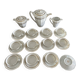 a vintage coffee or tea set in white porcelain with patterns and
