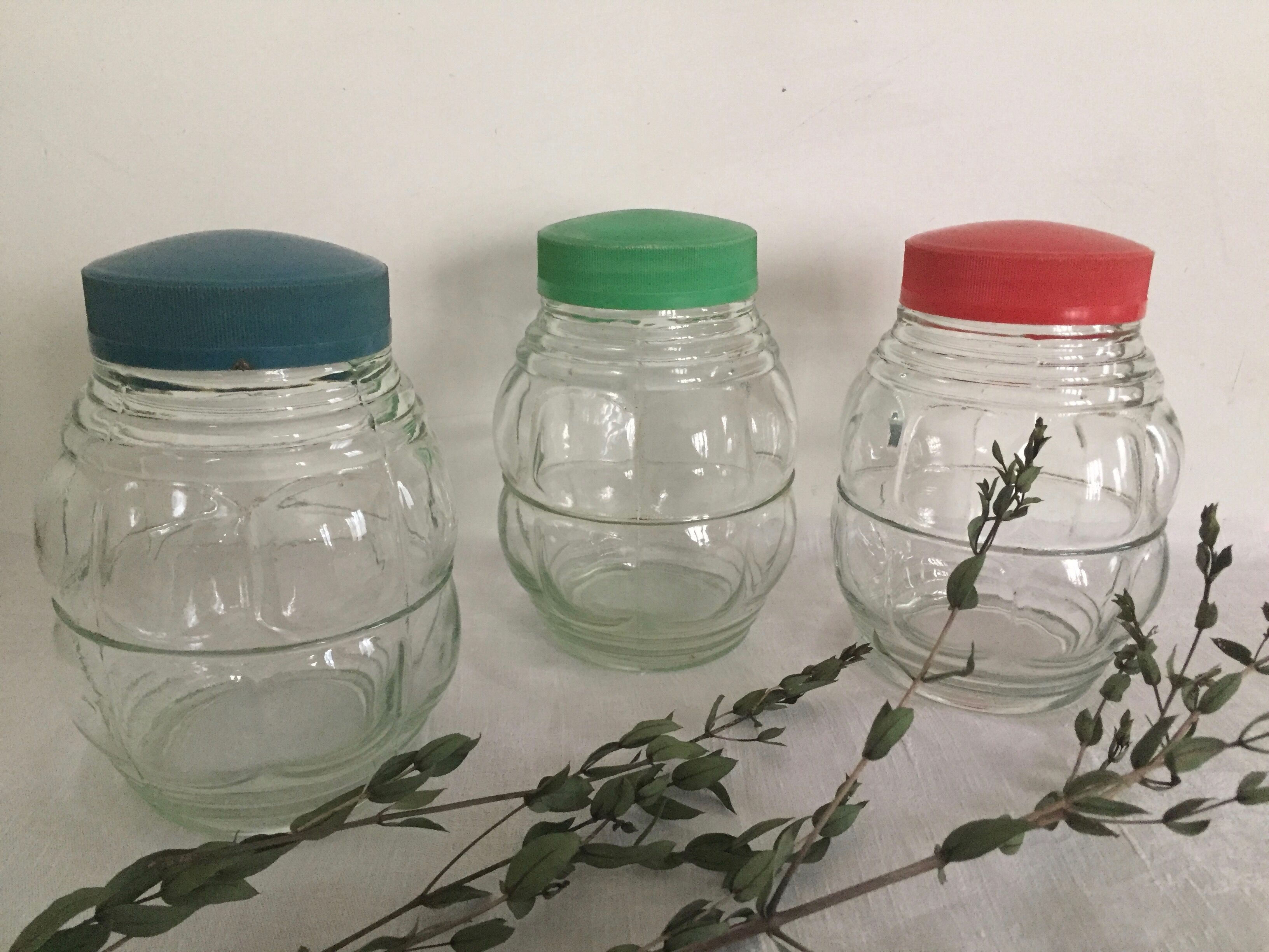 Vintage jar, curved shape with blue cap